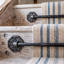 Load image into Gallery viewer, Gothic Botanical Stair Rods with Octagonal Plates, across a carpet runner on wooden stairs
