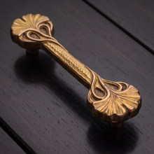 Load image into Gallery viewer, Lily Leaf Cabinet Handle – Aged Gold Finish, 110mm Centres

